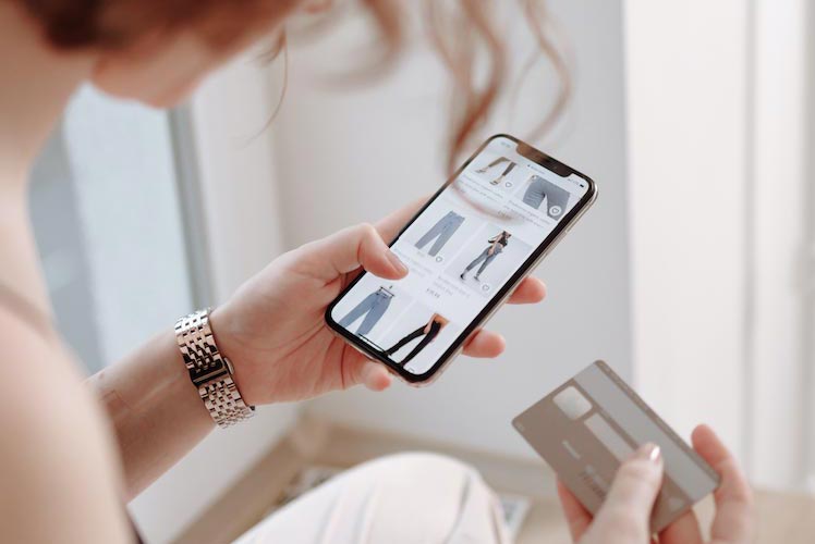 woman shopping online on mobile device